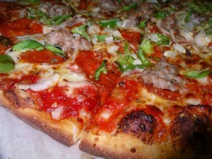 Pino's Pizza with green peppers and pepperoni