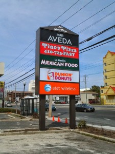 shopping center sign with Pino's Pizza on it in oCMD