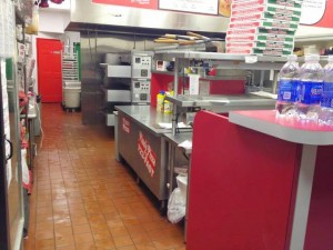 a clean profesional kitchen of Pino's Pizza